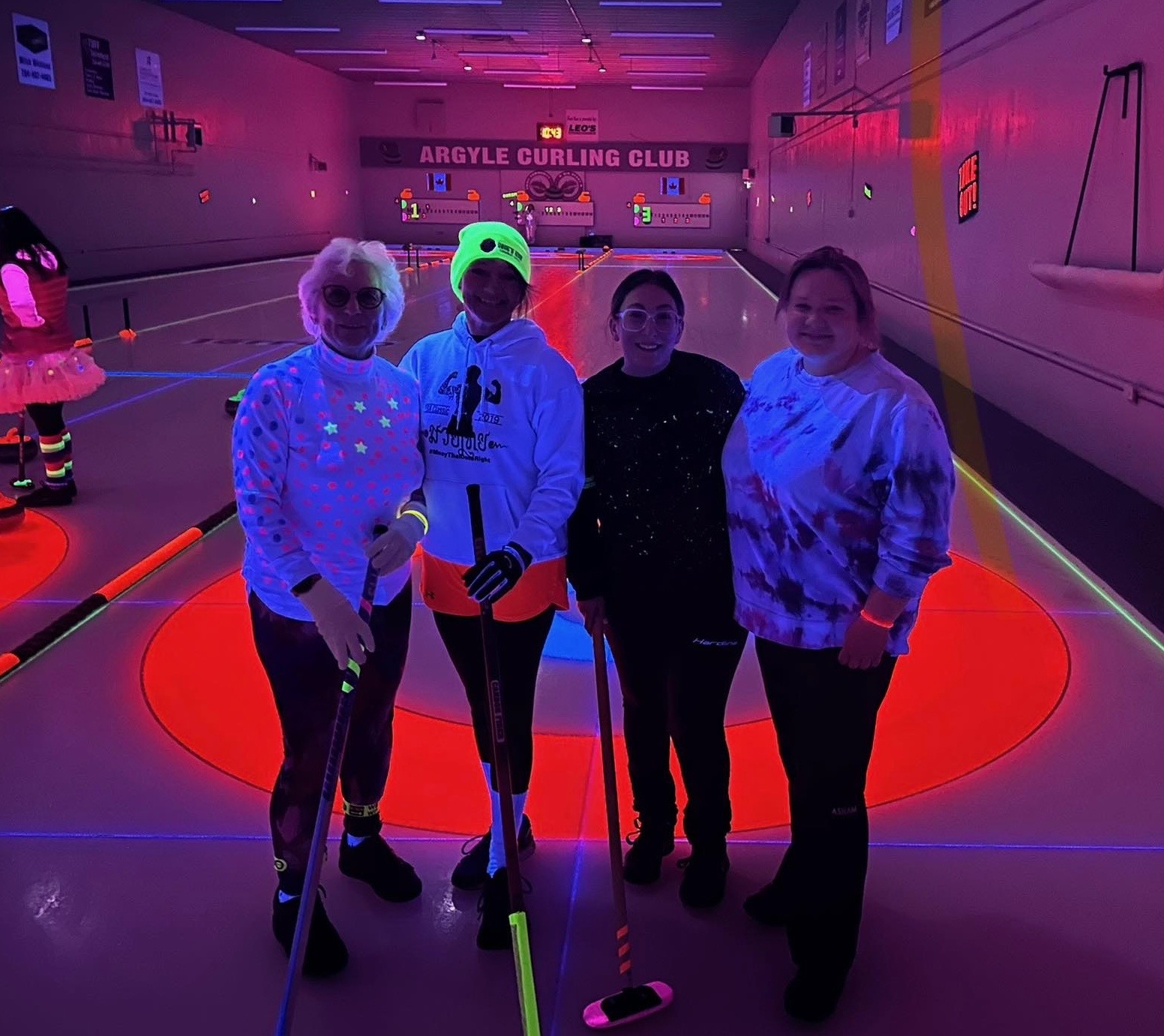Women's team at the Glow Bonspiel